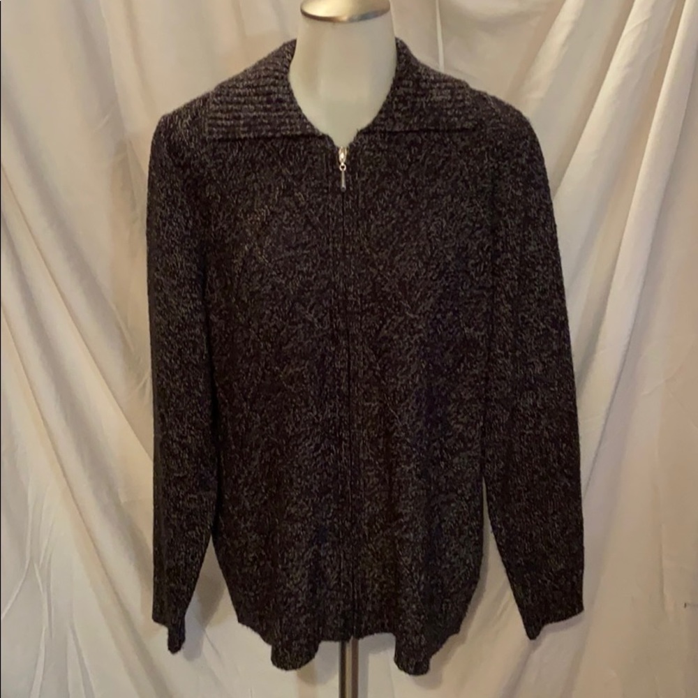 Woman’s sweater with zipper front.